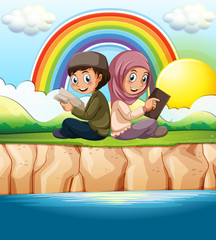 Muslim boy and girl reading book