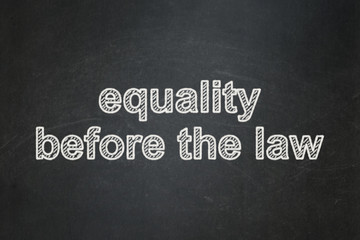 Obraz premium Political concept: Equality Before The Law on chalkboard background