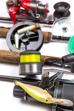 fishing tackles and baits with rods and reels