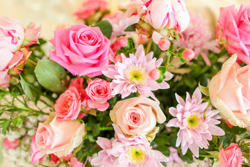 wedding bouquet with rose bush, Ranunculus asiaticus as a backgr