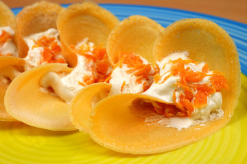 Khanom Beaung Thai or a kind of filled pancake Thai food or Thai Style Crisp Tart on tray, Thailand - (Selective focus)