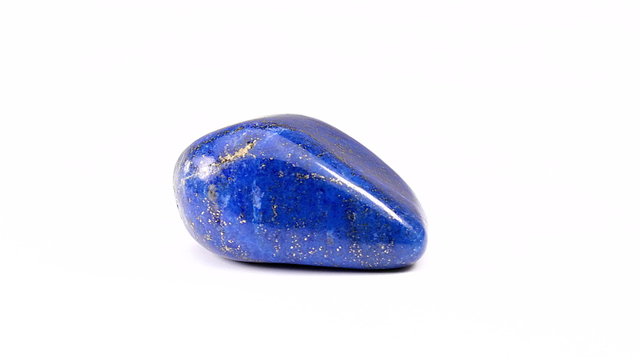 Lapis Lazuli gemstone rotating on a white background seamless loop 
