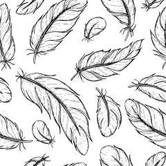Vector seamless pattern of hand drawn feather. Ink feather vinta