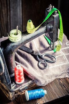 Tailor machine with scissors, threads and cloth