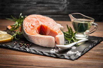 Fresh salmon on old wood