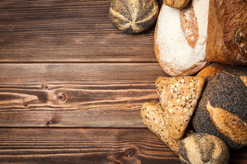 Bread assortment on wooden surface
