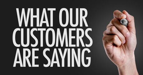 Hand writing the text: What Our Customers Are Saying