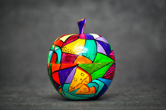 contemporary art, modern art. colorful wooden Apple. decorative fruit. Apple painted colors manually, handmade craft
