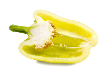 Fototapeta na wymiar Cut yellow sweet pepper isolated on white background