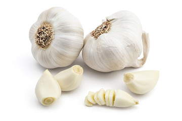 Fresh organic garlic, cloves and cutted garlic clove isolated on white background - 106023917