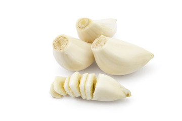 Fresh organic garlic cloves isolated on white background