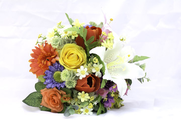 Artificial flowers on a white background