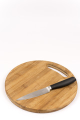 Knife on the wooden cuting board