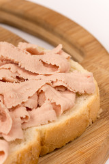 Close macro view of chicken liver pate sandwich