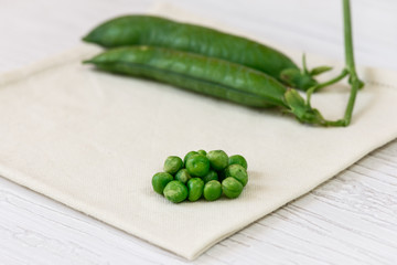 Green peas and pods, close-up
