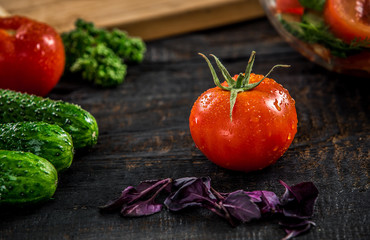 Male hands cutting vegetables for salad