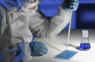 close up of scientist making test in lab