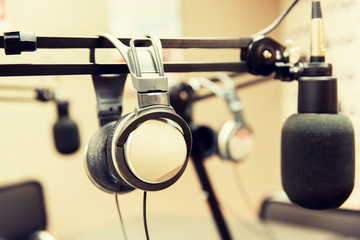 Fototapeta na wymiar headphones at recording studio or radio station
