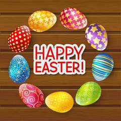 Easter eggs on wooden background 