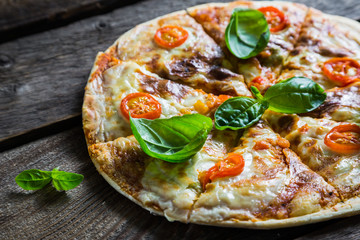 Pizza with fresh basil