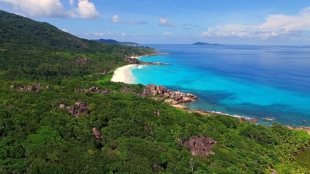 Aerial view of tropical beach Grand Anse) on La Digue island, Seychelles.