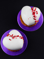 Heart shaped glazed mousse cakes