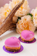 Heart shaped french pastry with pink glaze