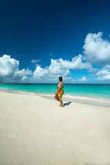Fototapeta na wymiar Woman in Caribbean Beach