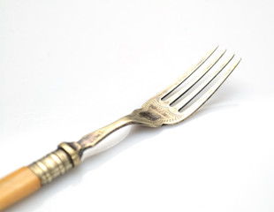 Vintage fork on a white background, retro
