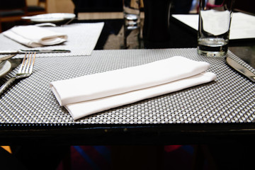 cutlery and napkin in a restaurant