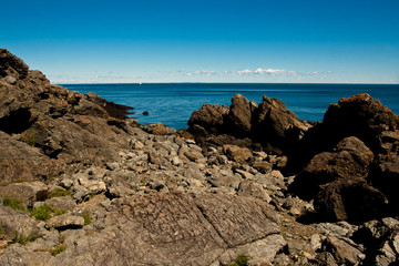 Lots of places to hide a geocache, rocky shore of the Bay of Fundy.