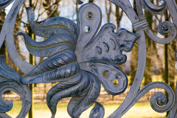 gold iron fence in the center