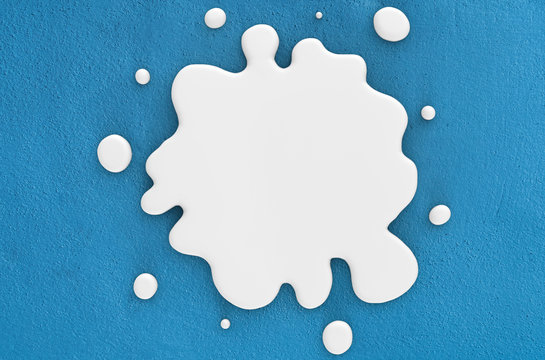 milk splatter on blue background