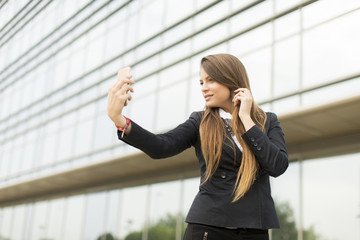 Fototapeta premium Woman taking selfie
