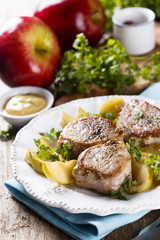 Fried pork with apples and mustard