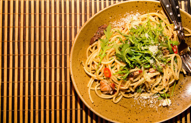 Italiant Pasta spaghetti with meat, red pepper, Parmesan cheese