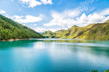 View of lake Ritom with the Alps in background, Piora, Canton Ticino of Switzerland  © EleSi