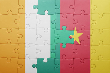 puzzle with the national flag of cote divoire and cameroon
