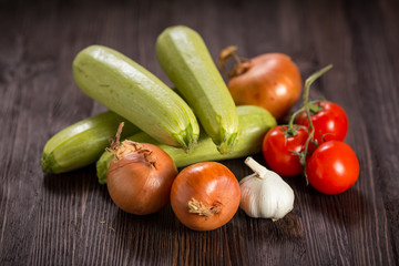 Vegetables on a dark wooden background