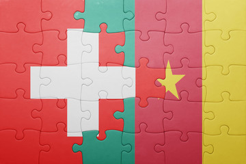 puzzle with the national flag of switzerland and cameroon
