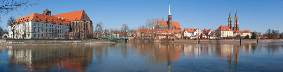 Panorama of Ostrow Tumski island, Odra (Oder) river and towers of gothic Cathedral of St. John the Baptist in Wroclaw,  Poland