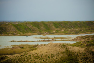 fishers inside  a tributary of Tigris river in Iraq at spring season