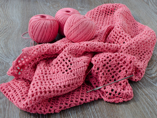 Fototapeta na wymiar Three skeins of pink yarn
