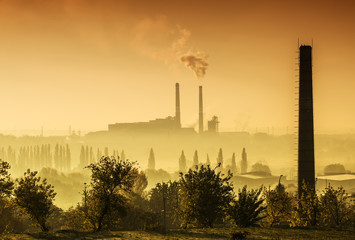 Power station with smoking chimney