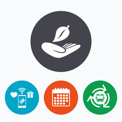 Nature insurance sign. Hand holds leaf symbol