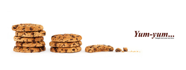 Stacks of partially eaten cookies. Yummy choc-chip biscuits