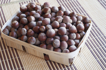 Hazelnuts in a wicker basket.