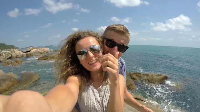 Young Сouple Taking Selfie by Sea on Honeymoon. 4K.