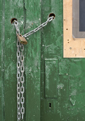 Detail of a green wooden door