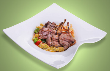 Chops on white plate.